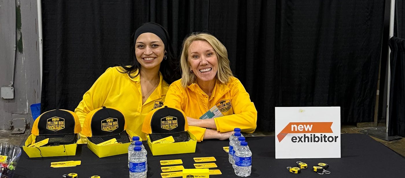 Custom promotional items for Yellow Box Dumpsters at a trade show